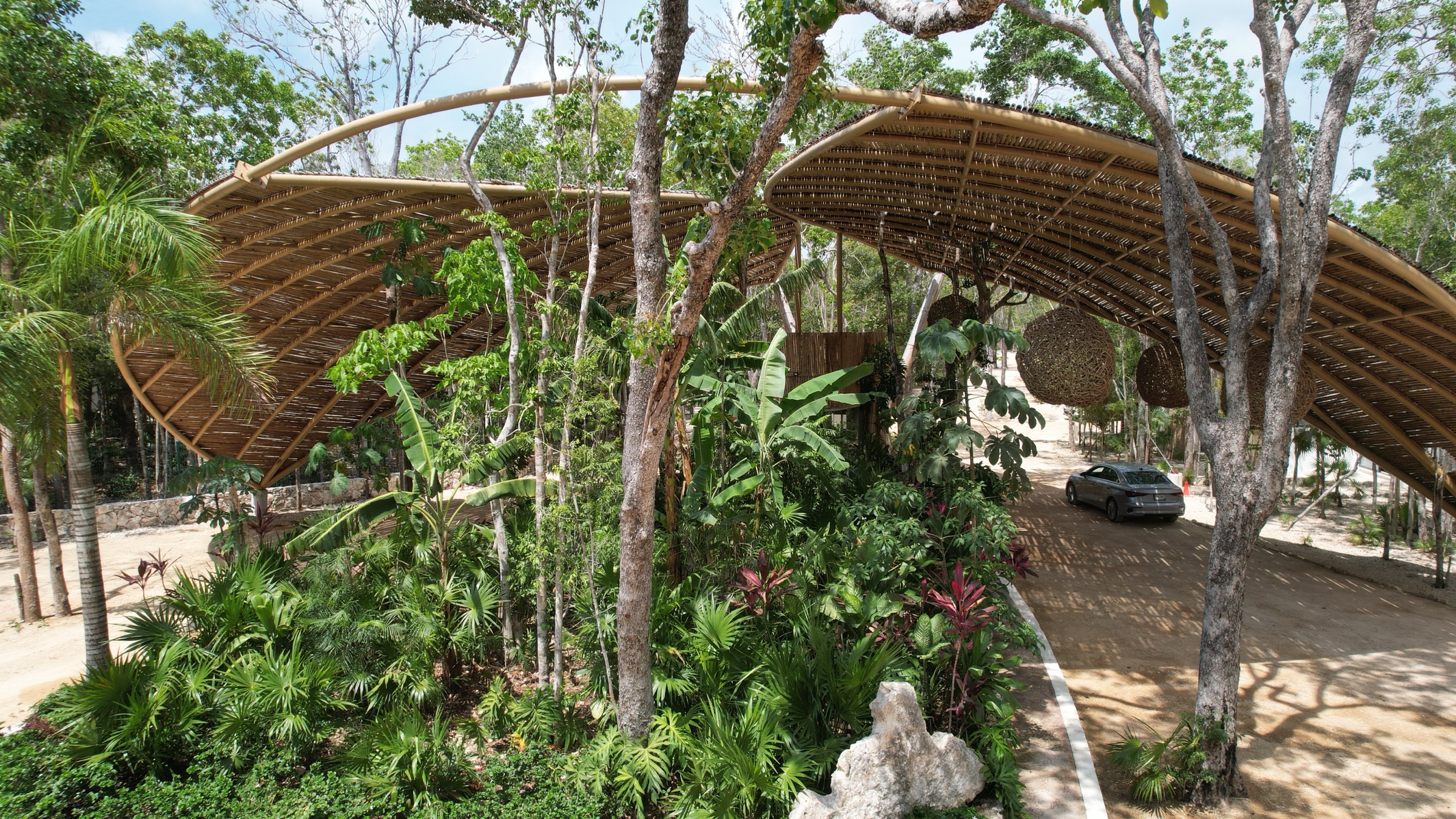 Bamboo entrance pavilion at the Axkaba subdivision, Tulum