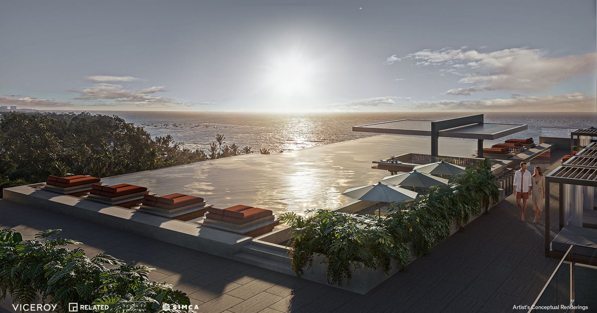 Developer rendering of Viceroy Residences Playa del Carmen, aerial view of the coastline and rooftop pools (pre-construction: the building does not exist yet).
